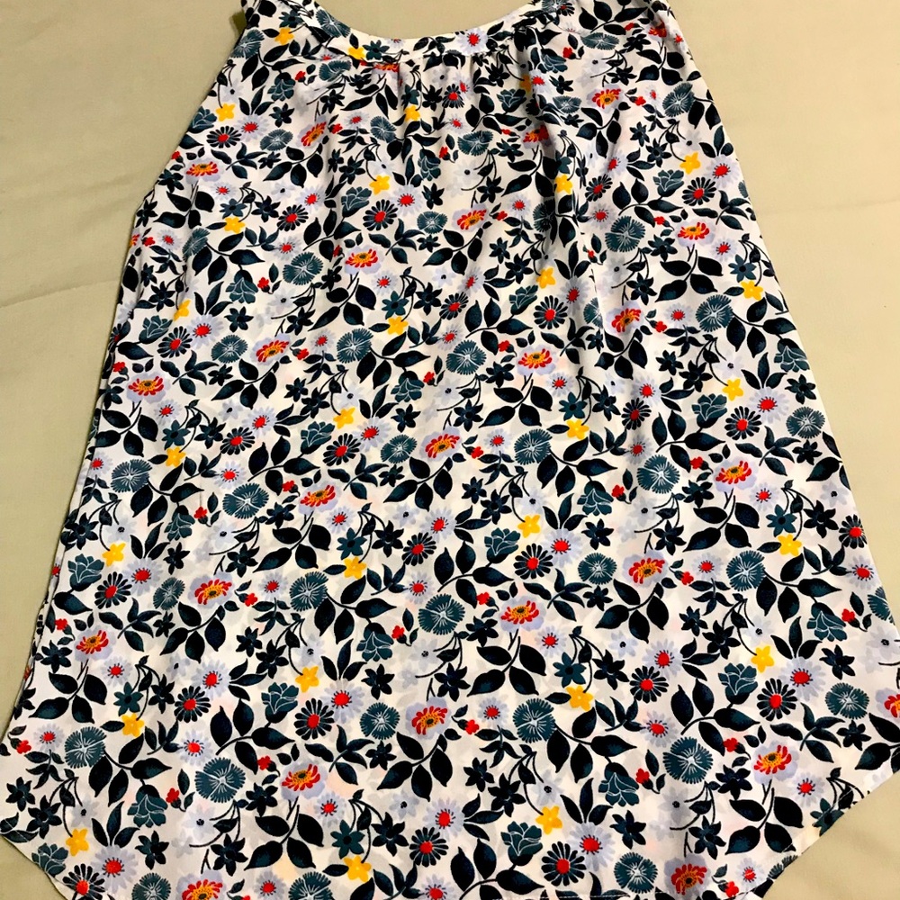 Multi colored, sleeveless blouse from The Loft. Size xs.  Listing for $5.00